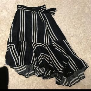 A piece-apart high low silk wrap skirt